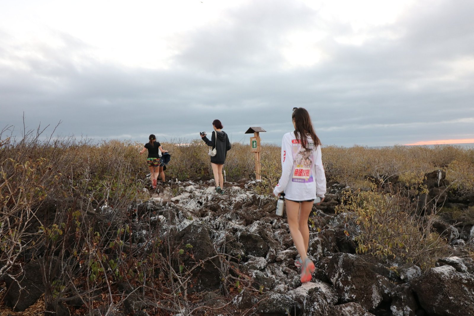 Family exploring Galápagos during a luxury cruise excursion